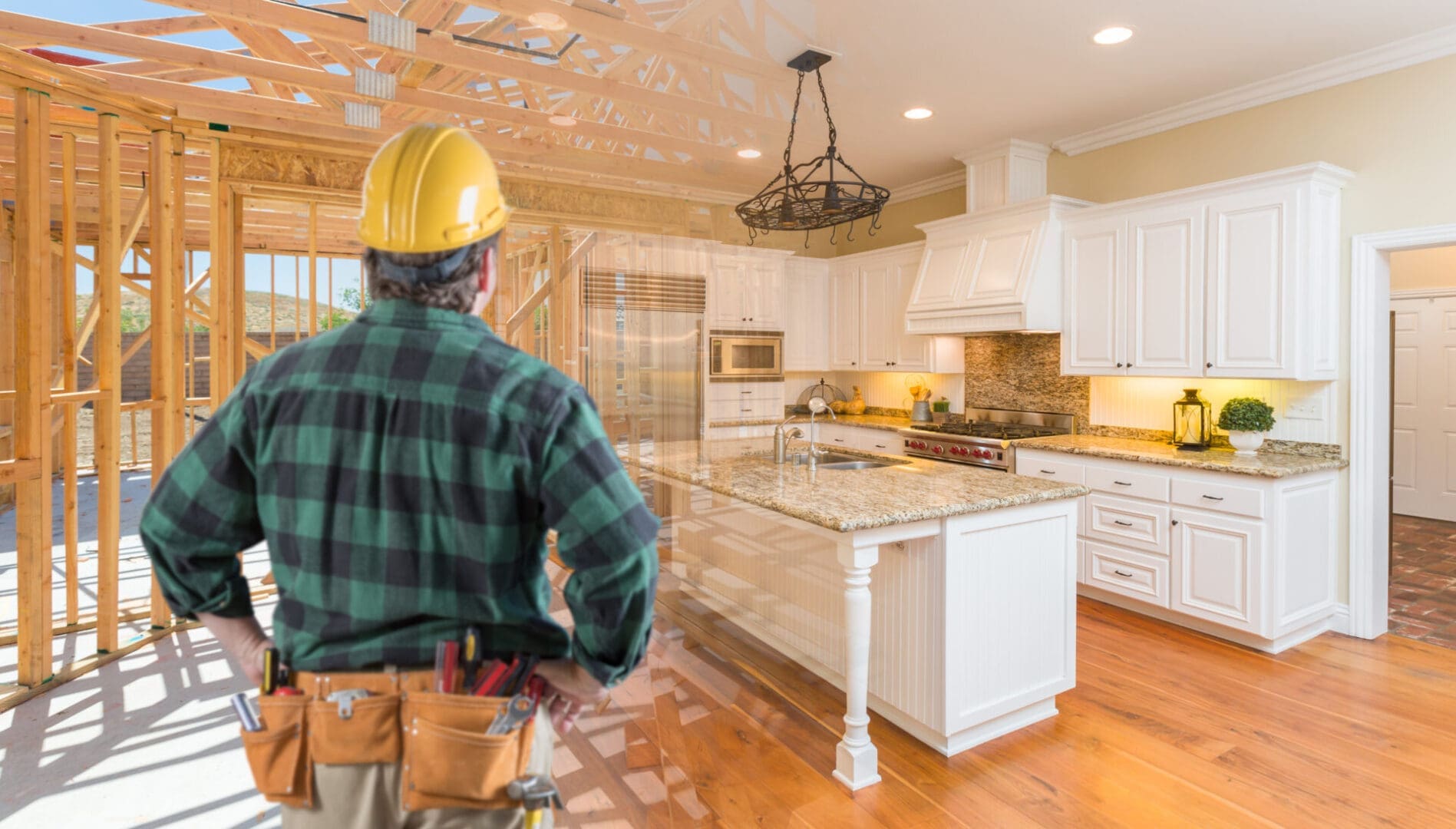 Construction worker envisioning completed kitchen design.